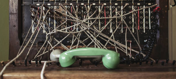 A telephone exchange full of wires.